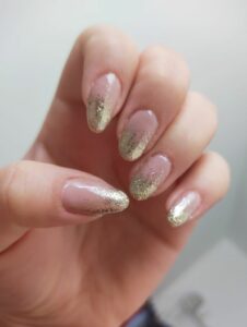 beige nails with glitter