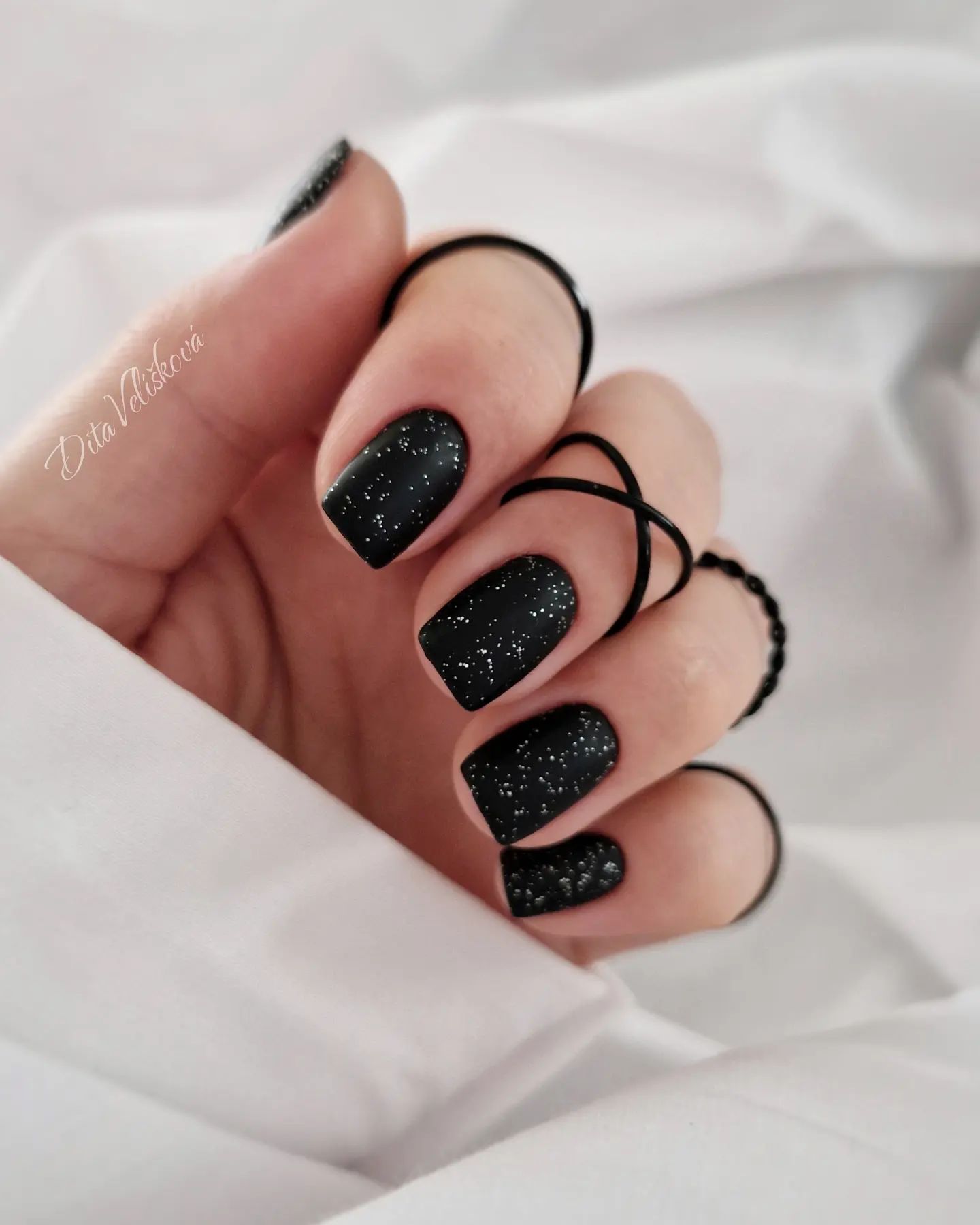 black and silver nails