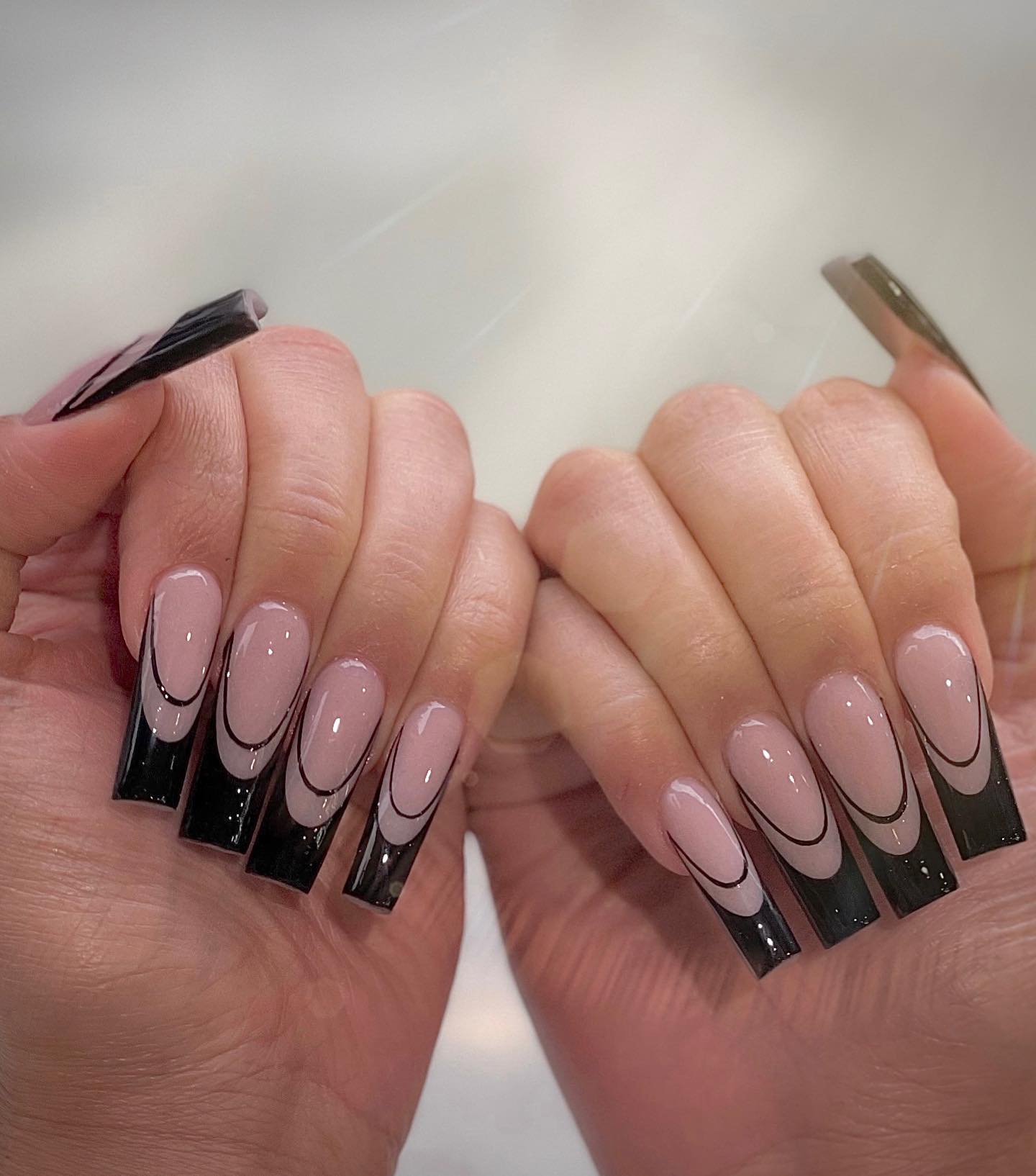 Edgy Black French Tip Coffin Nails