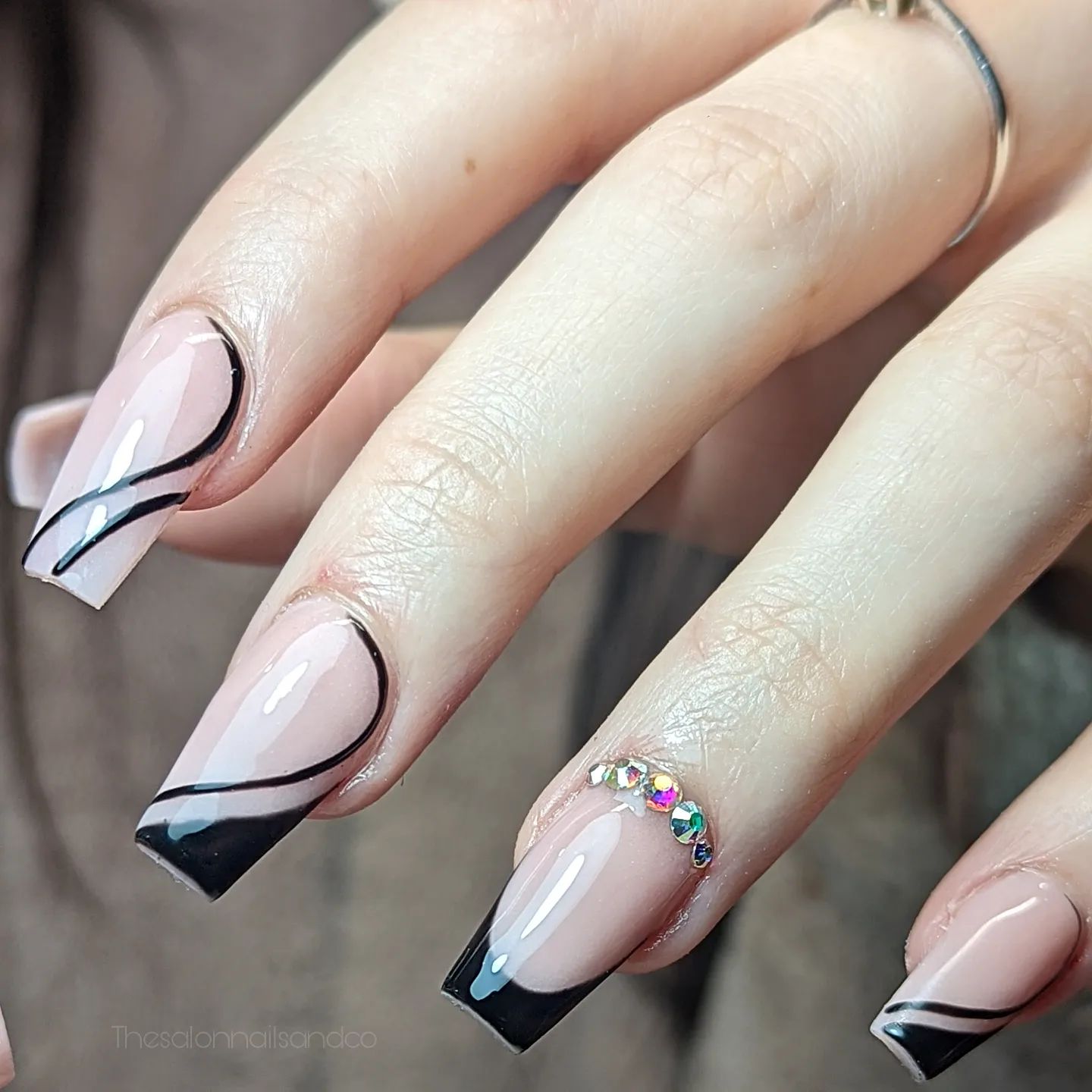 Edgy Black French Tip Coffin Nails