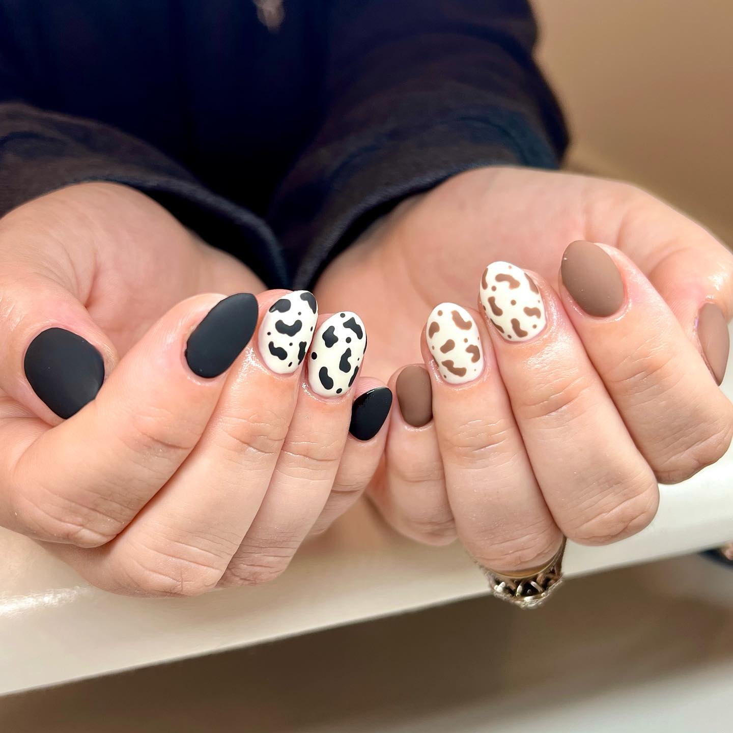 brown cow print nails