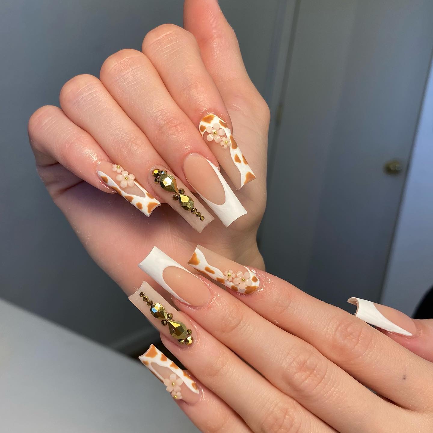 brown cow print nails