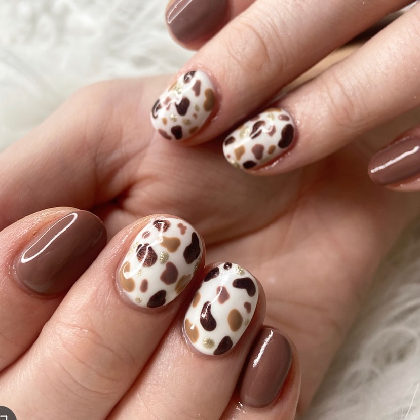 brown cow print nails