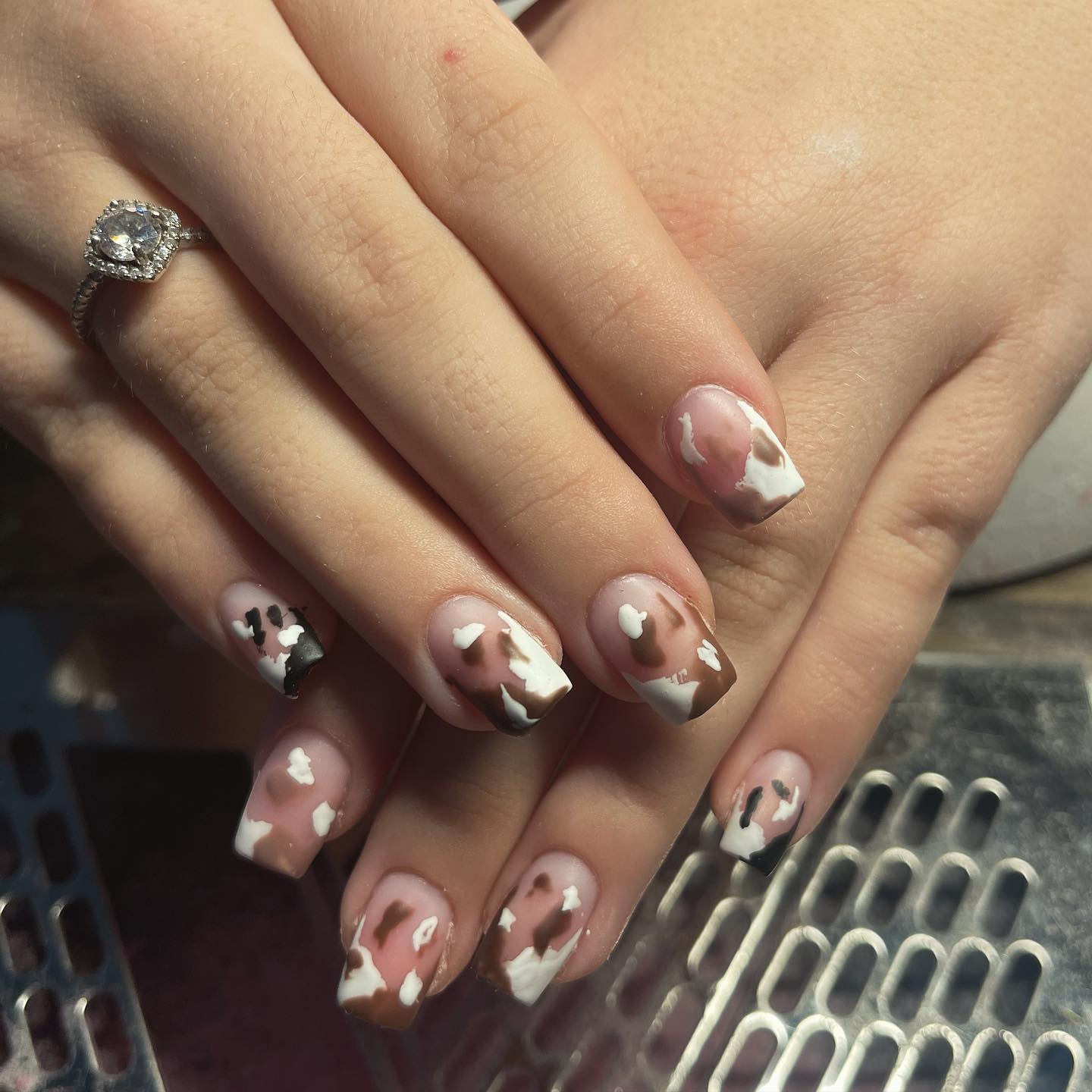 brown cow print nails