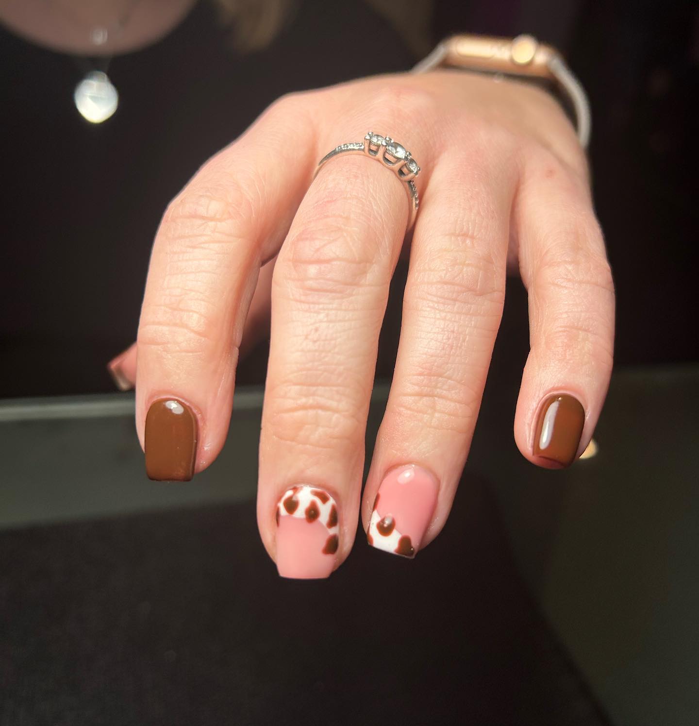 brown cow print nails