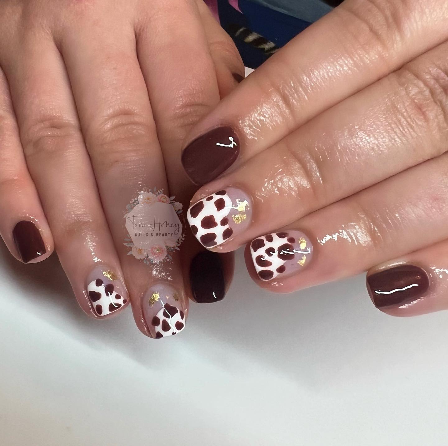 brown cow print nails