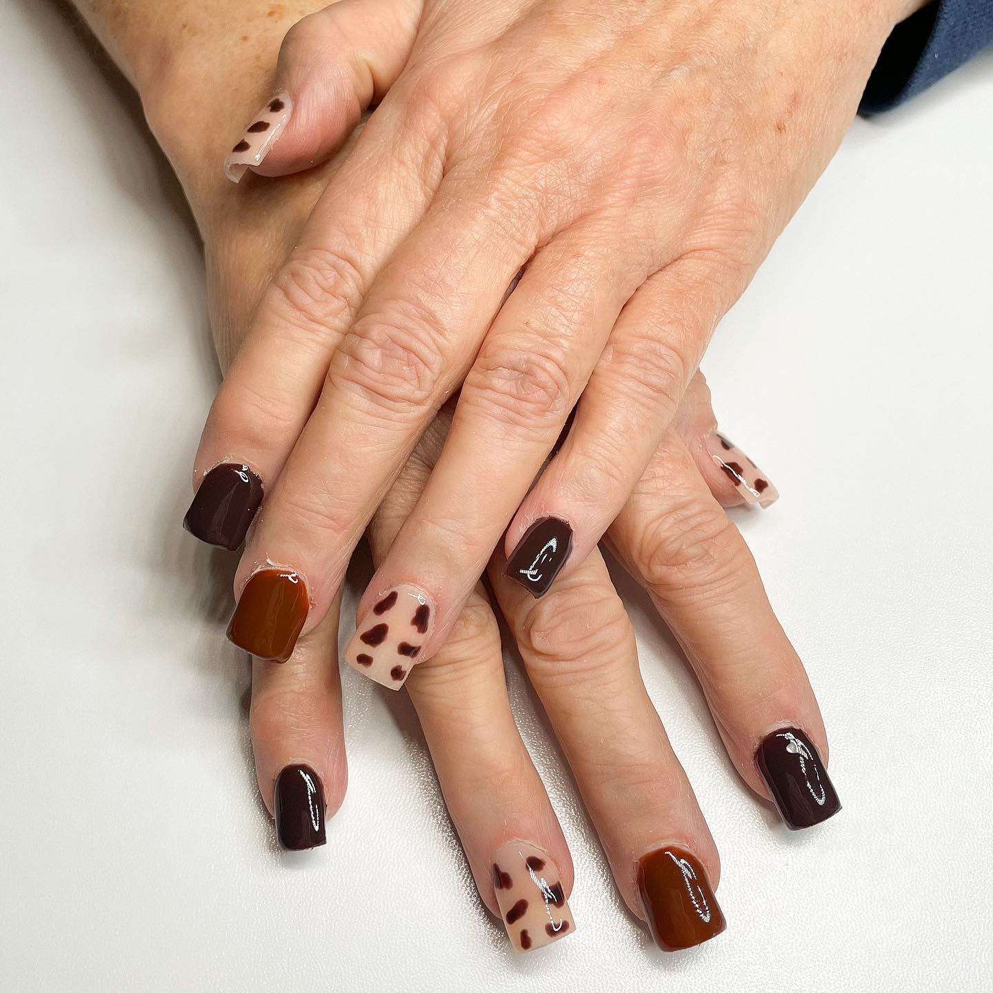 brown cow print nails