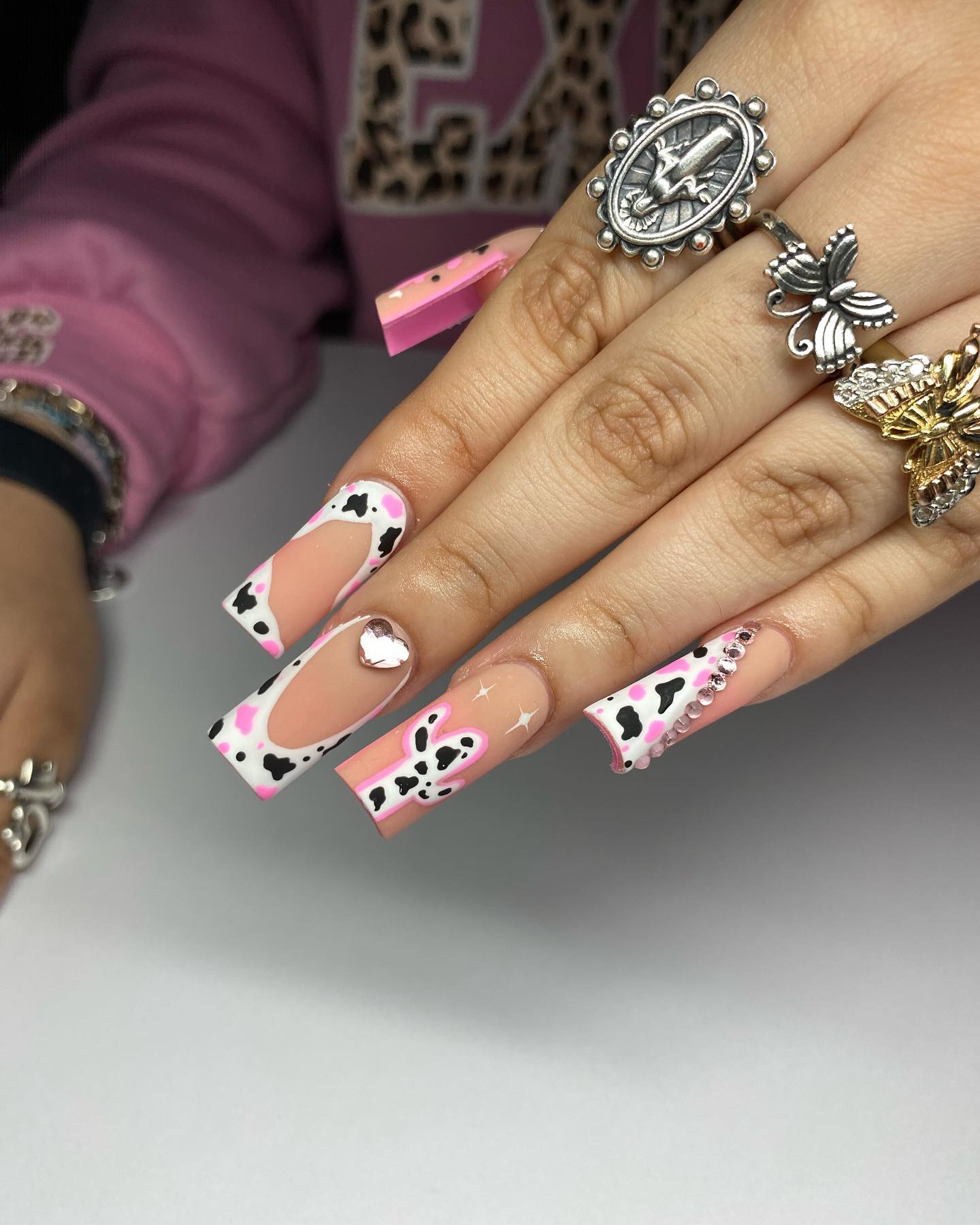 pink cow print nails