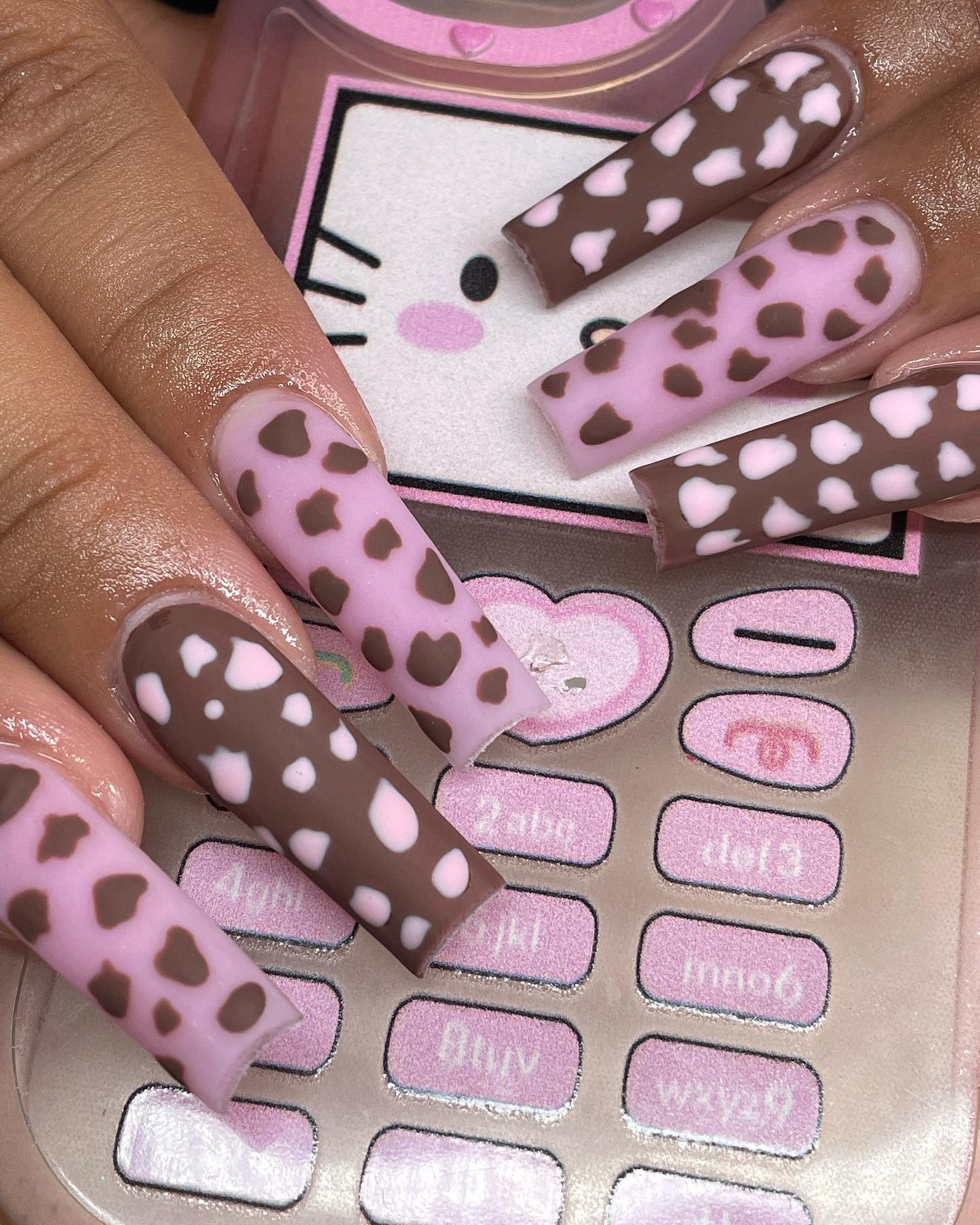 pink cow print nails