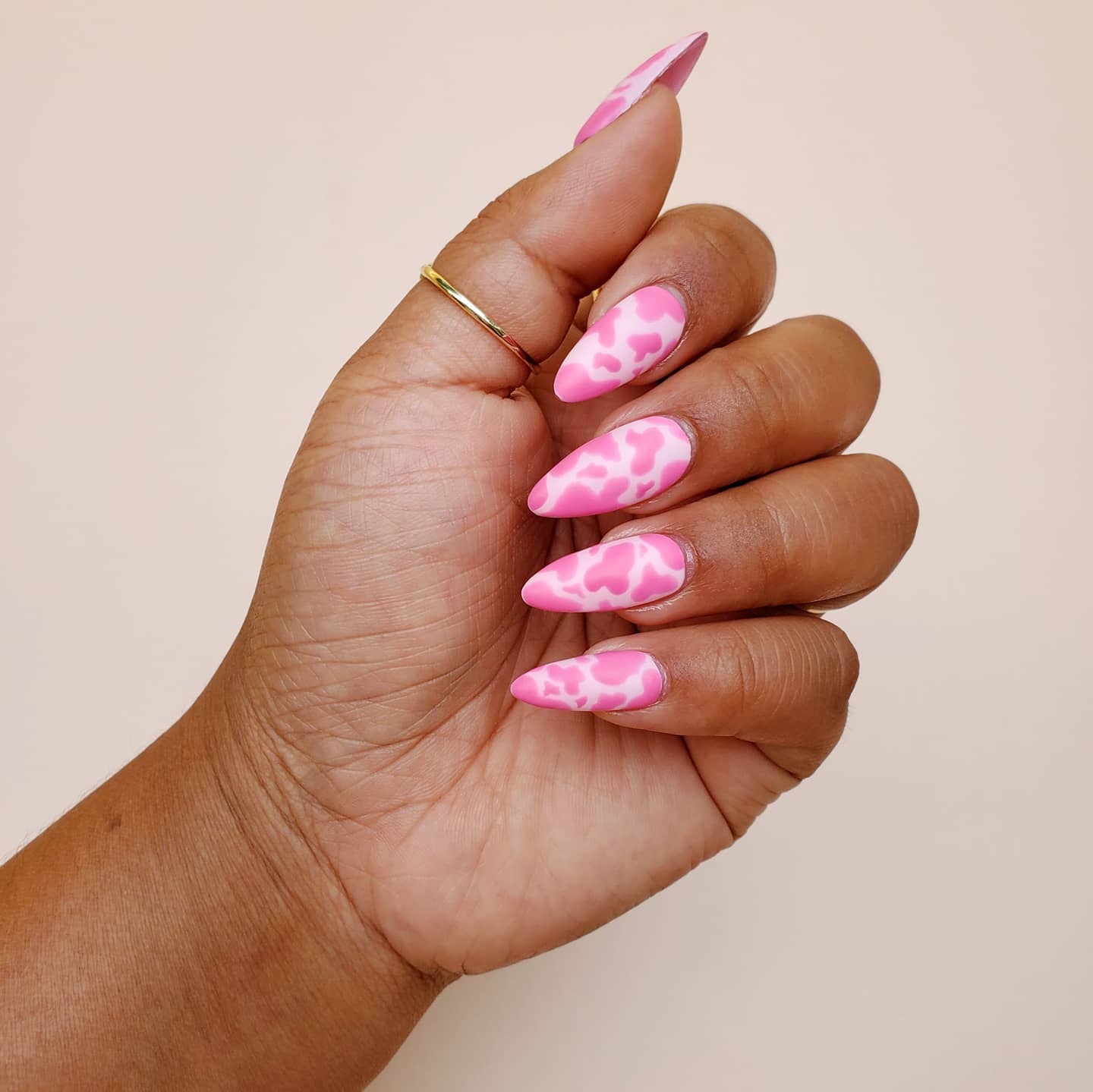 pink cow print nails