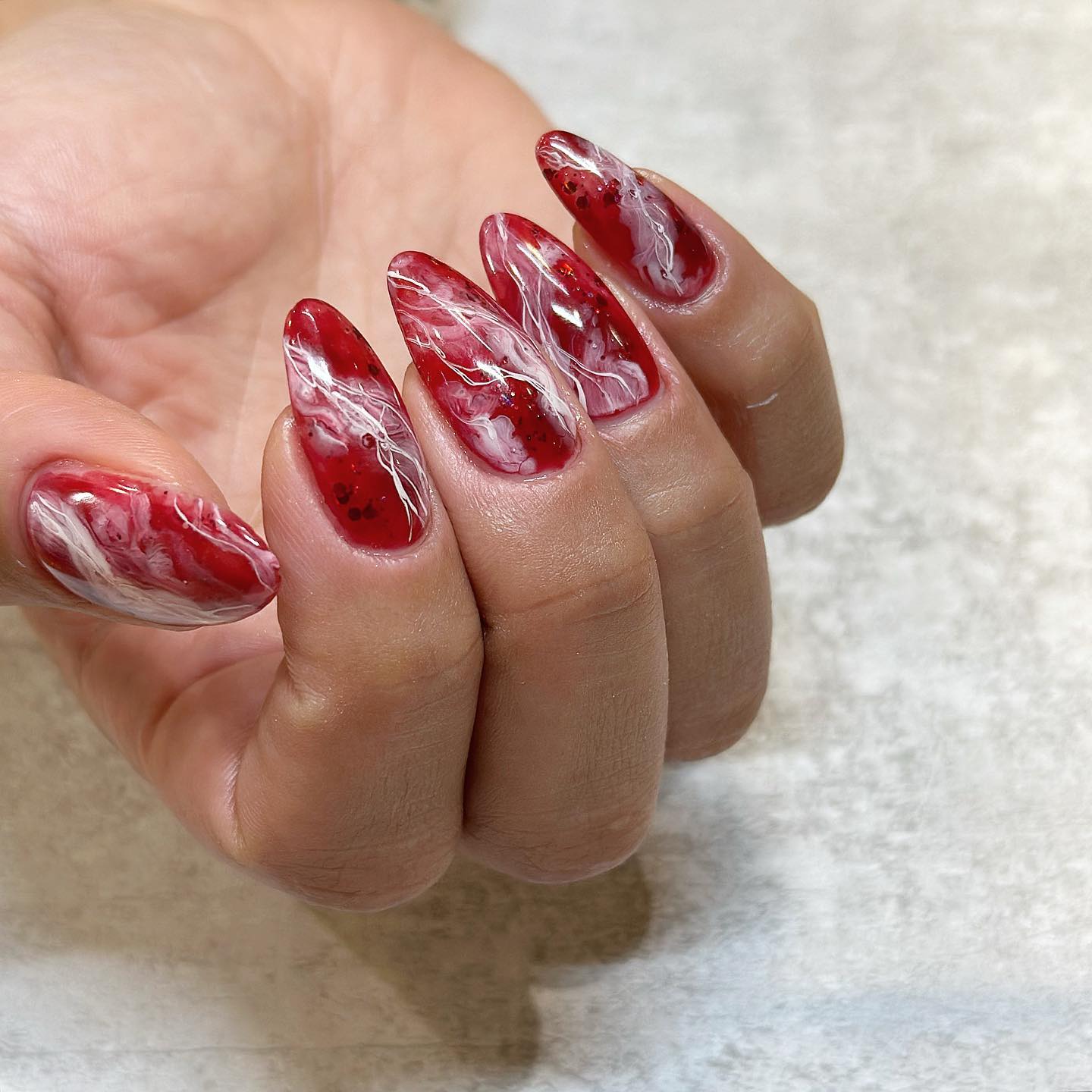 red and white marble nails