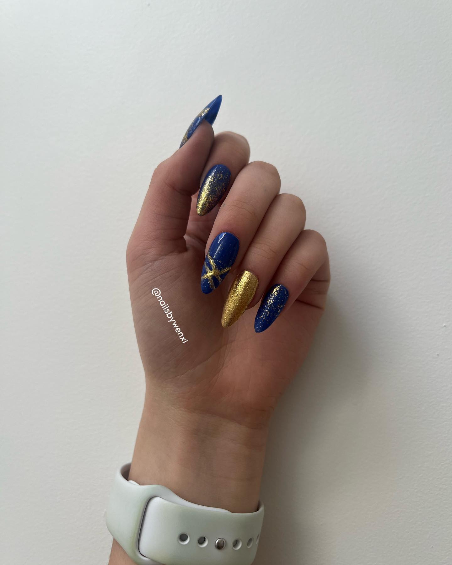 Navy Blue and Gold Nails