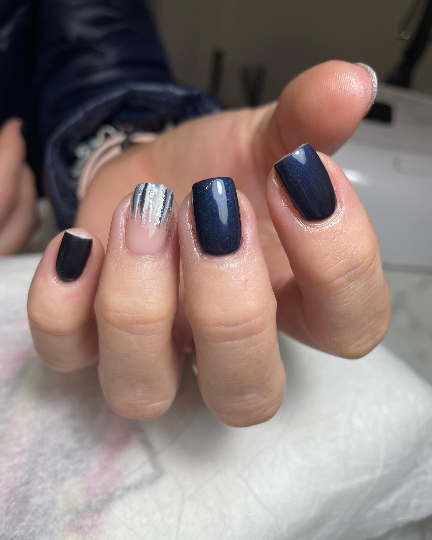 navy blue and silver nails