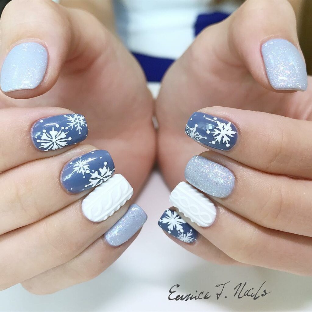 Blue and White Snowflake Nails