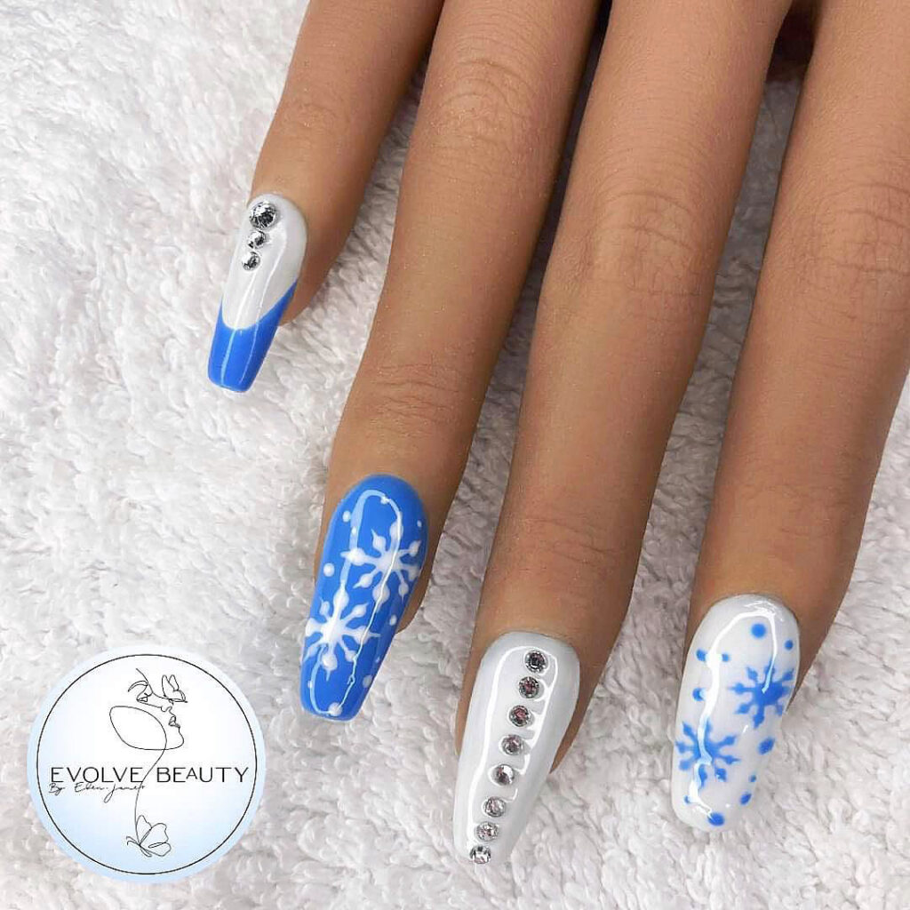 Blue and White Snowflake Nails