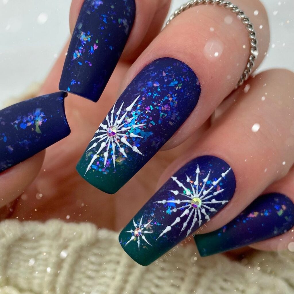 Blue and White Snowflake Nails