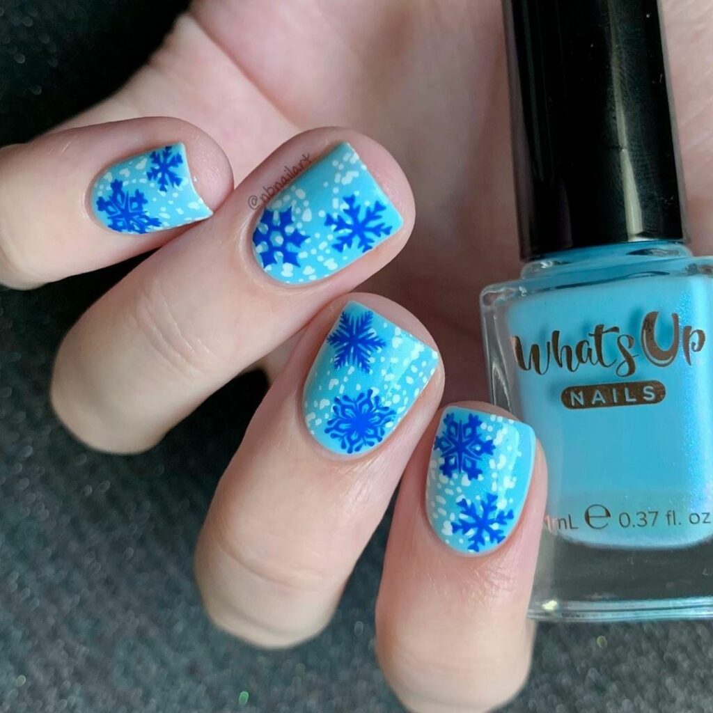 Blue and White Snowflake Nails