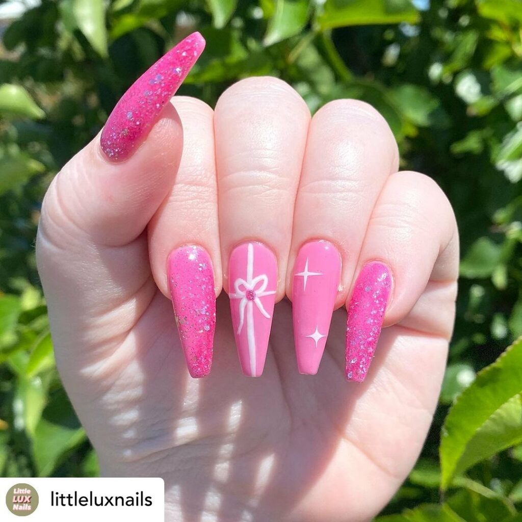 Pink and White Snowflake Nails