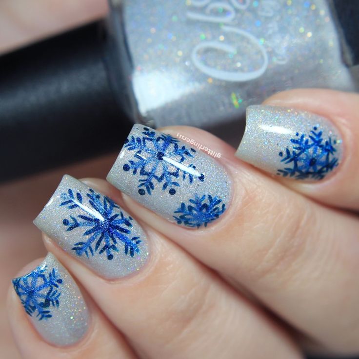 White Nails With Blue Snowflake